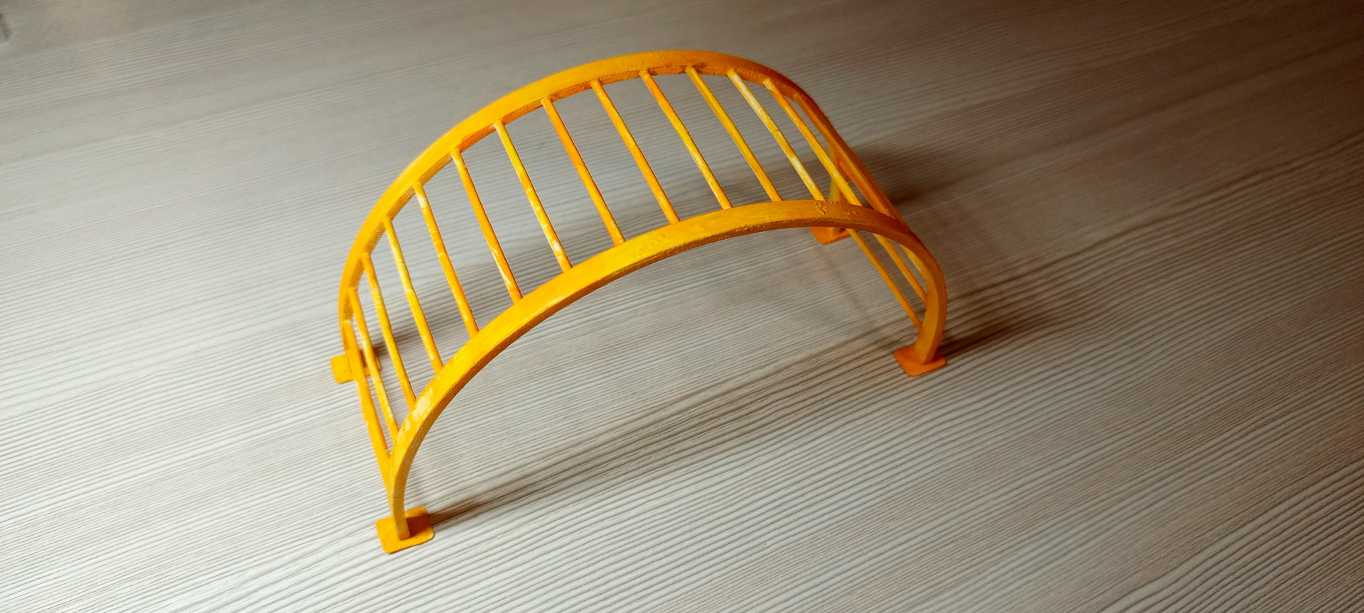 photo 1 semicircular climbing frame in the yard